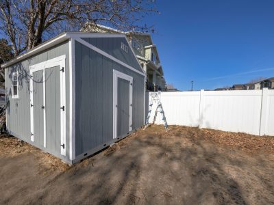 Metal Gray Garage In The Countryside Under The Clear Blue Sky